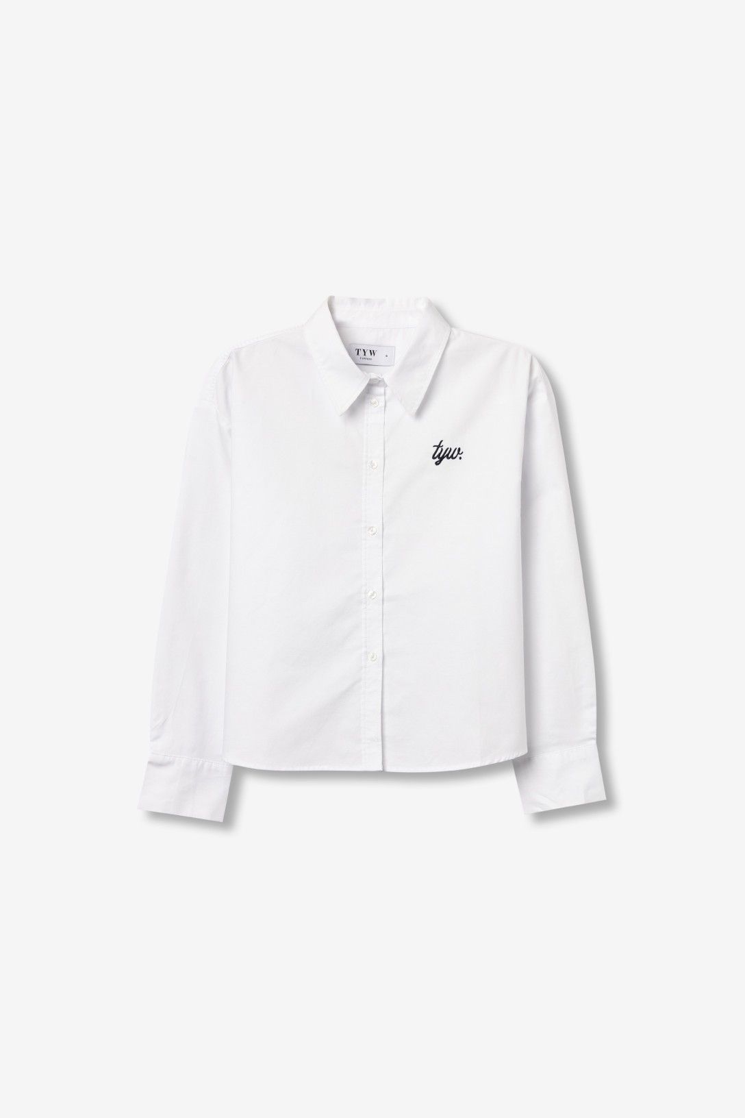Camisa manga larga blanca con bordado.