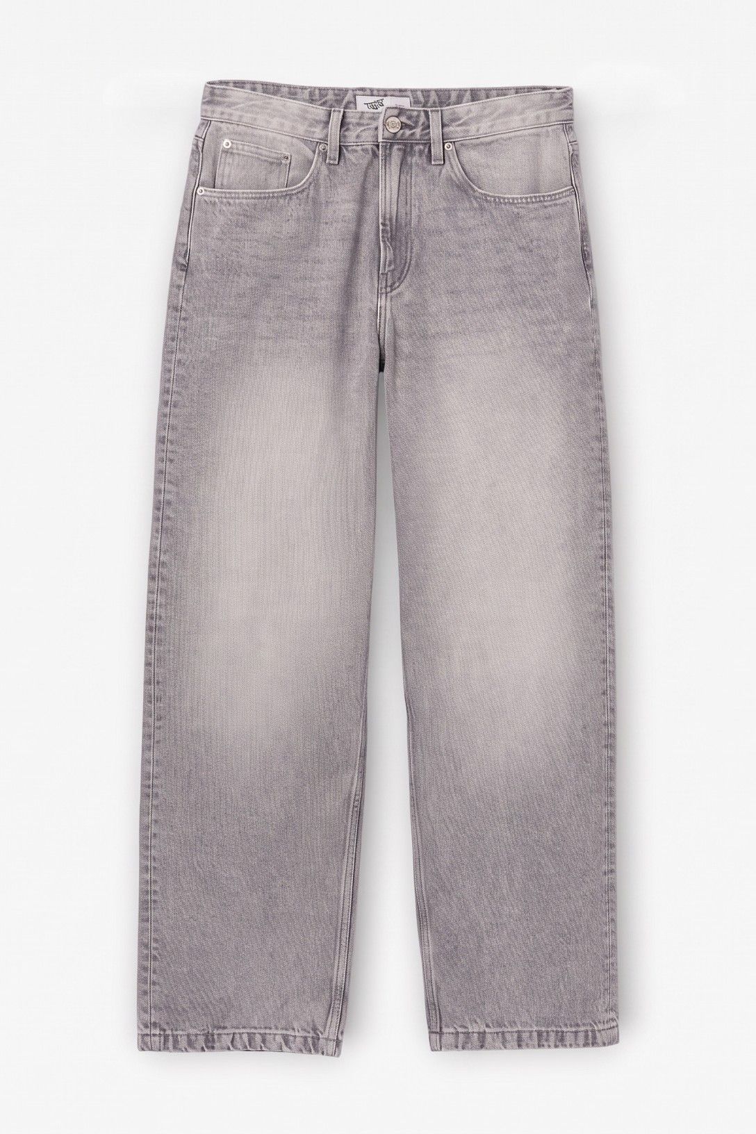 Pantalón vaquero corte relajado de pernera ancha y tiro medio, chico.
