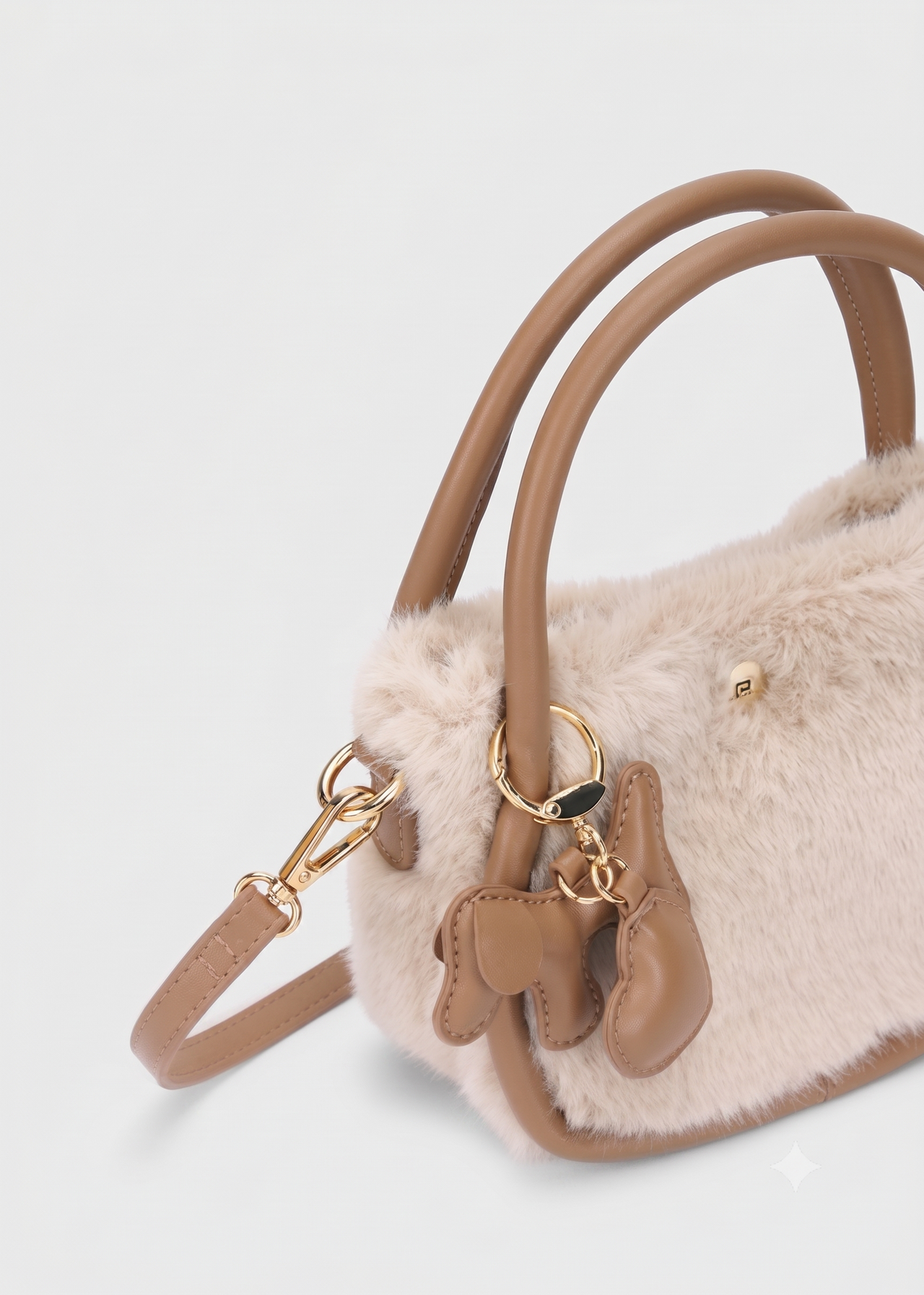 Bolso bandolera de pelo con llavero perrito y doble asa niña.