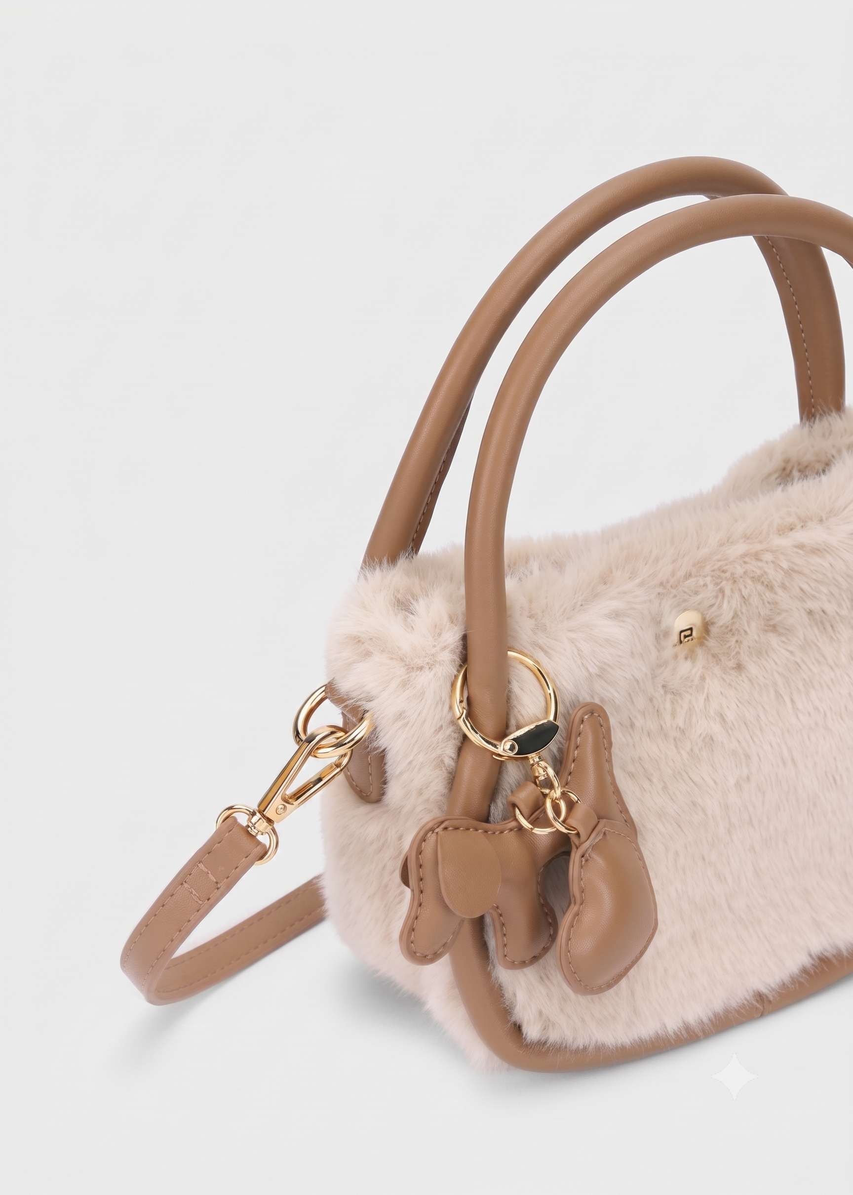 Bolso bandolera de pelo con llavero perrito y doble asa niña.