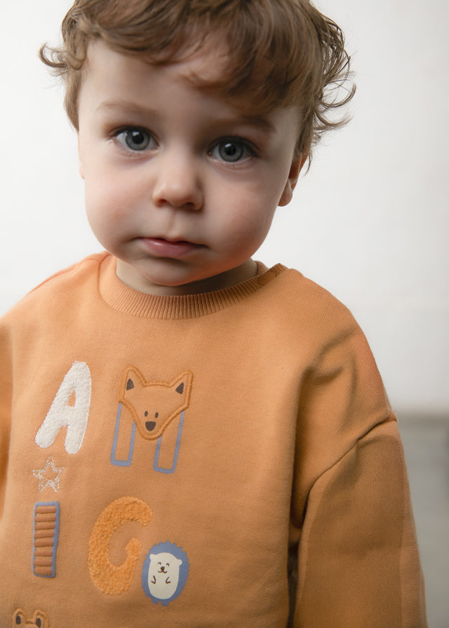 Susadera  sin capucha letras, bebé niño.