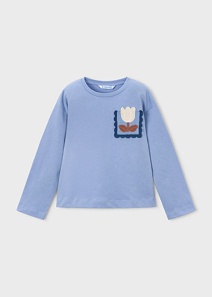Camiseta manga larga bolsillo tricot niña.