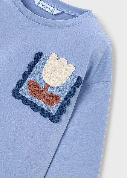 Camiseta manga larga bolsillo tricot niña.