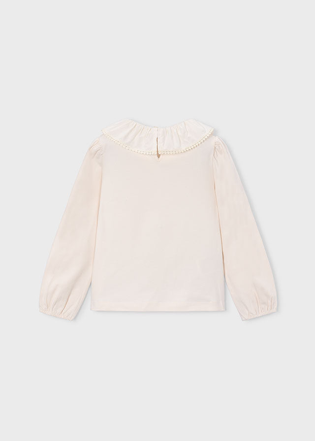 Blusa cuello volante niña