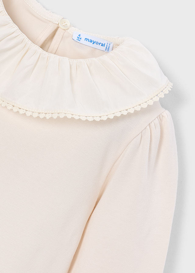 Blusa cuello volante niña