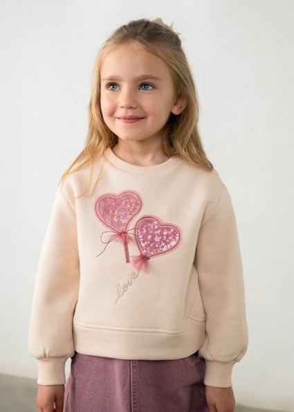 Sudadera con apliques corazones