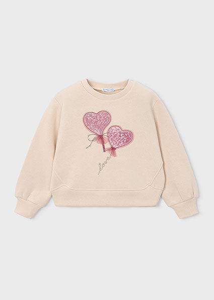 Sudadera con apliques corazones