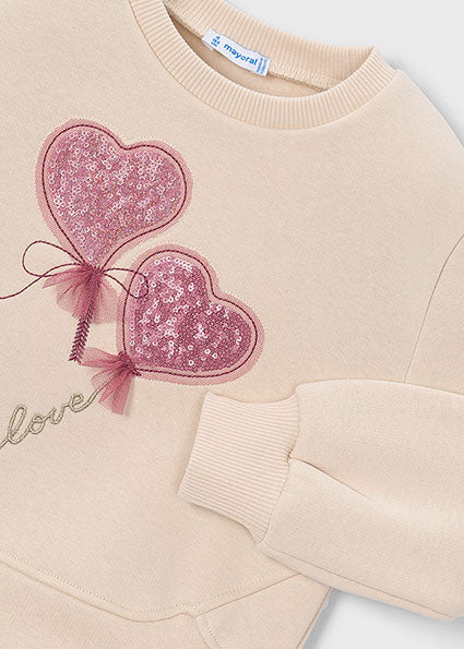 Sudadera con apliques corazones