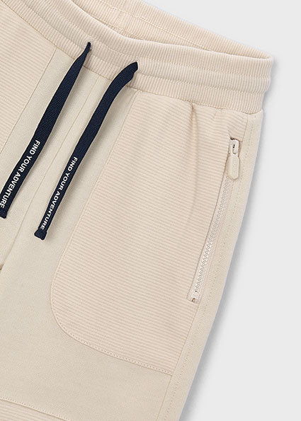 Pantalón jogger con cremallera en bolsillos niño