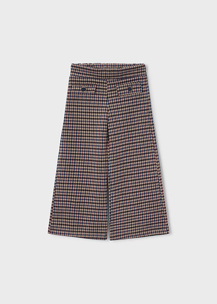 Pantalon punto Corte wide leg. Pernera ancha y fluida niña.