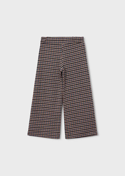 Pantalon punto Corte wide leg. Pernera ancha y fluida niña.