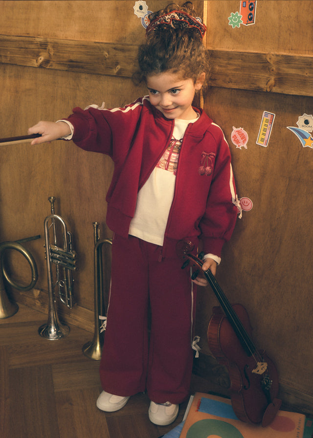 Conjunto  dos piezas: Sudadera con capucha y pantalón de pernera ancha, niña.
