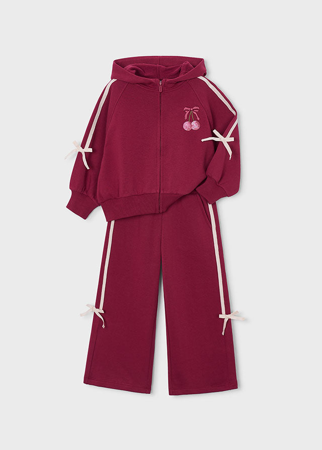Conjunto  dos piezas: Sudadera con capucha y pantalón de pernera ancha, niña.