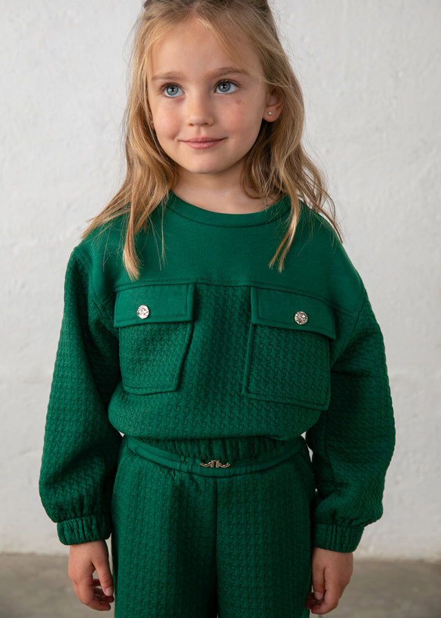 Conjunto de sudadera y pantalón texturizado en verde botella, niña.