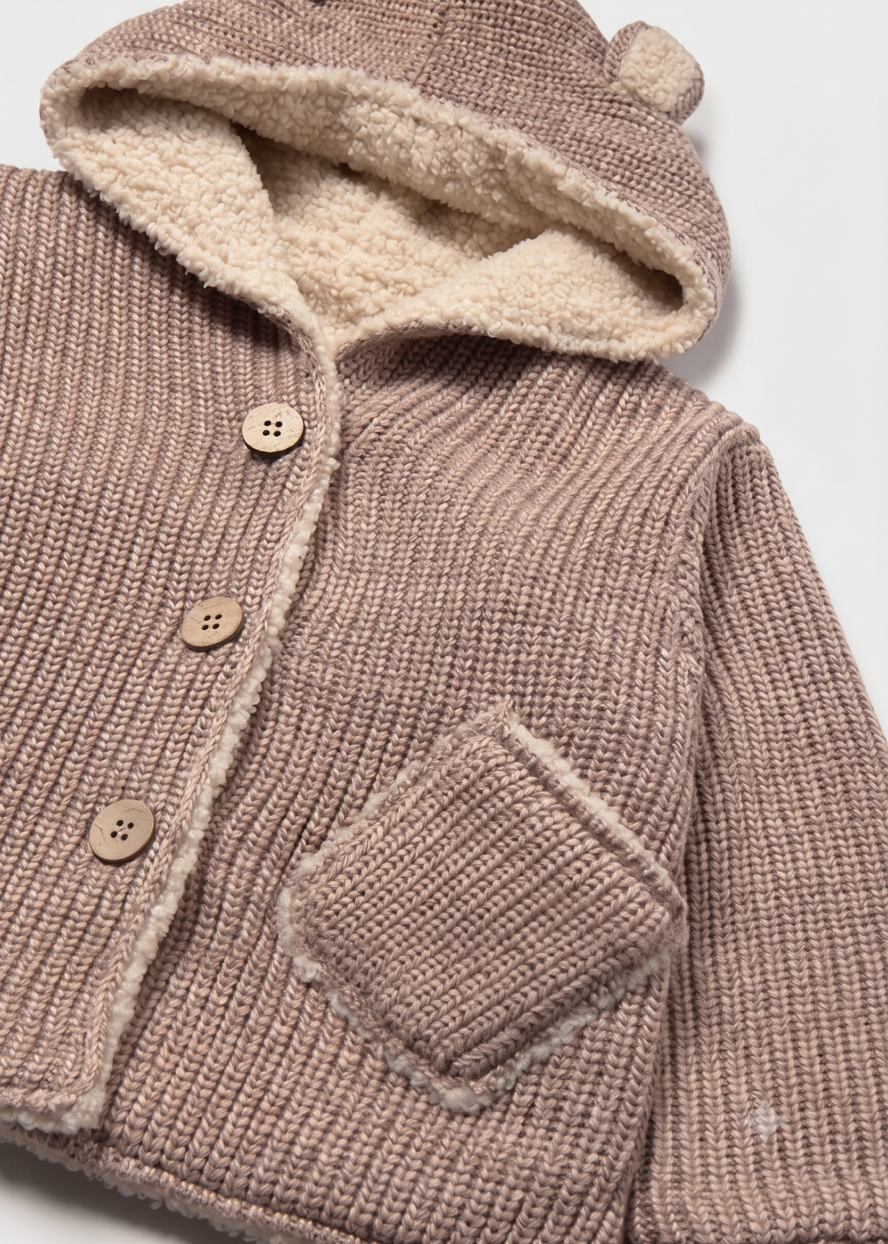 Canguro tricot reversible bebé niña.
