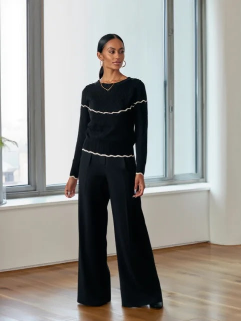 Jersey de punto con volante en el pecho