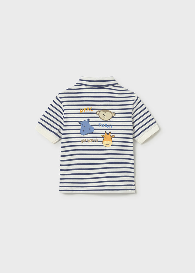 Polo bebé a rayas con estampado .