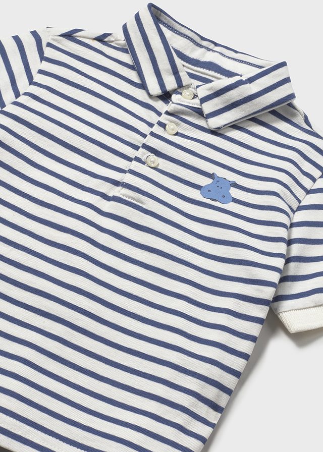 Polo bebé a rayas con estampado .