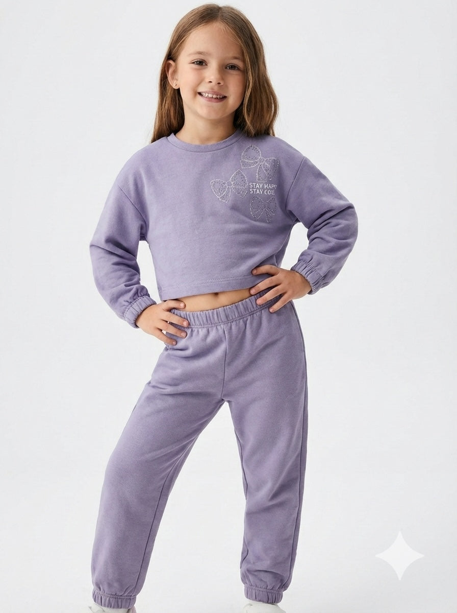 Conjunto deportivo dos piezas: Susadera y pantalón, niña.