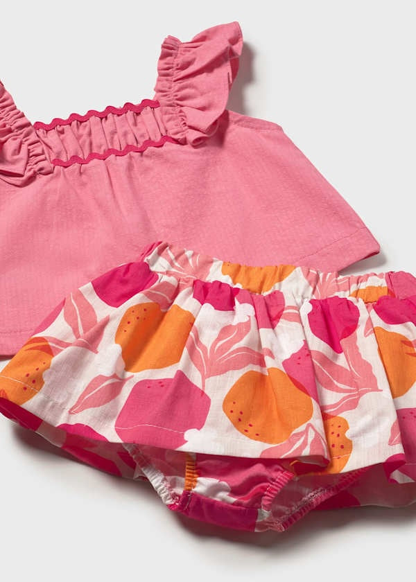 Conjunto falda estampada y blusa bebe