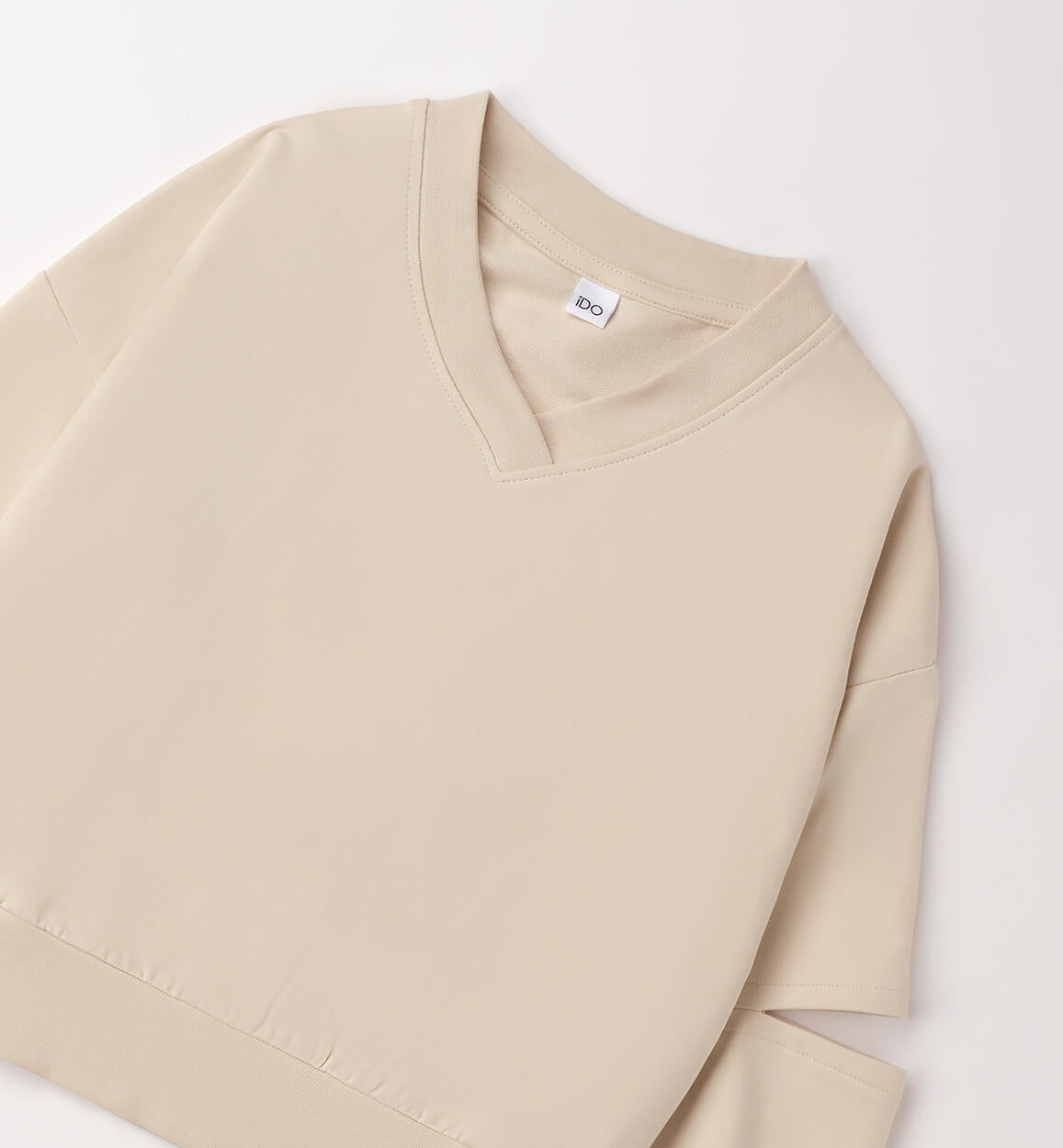 Sudadera aberturas en las mangas