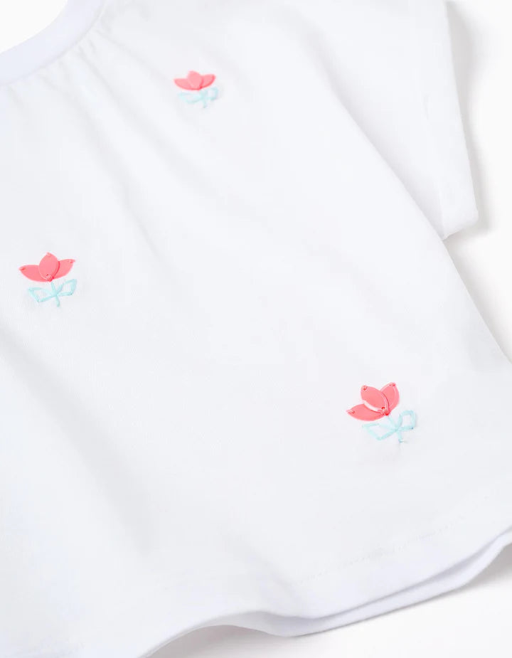Camiseta corta con detalle de flores en lentejuelas