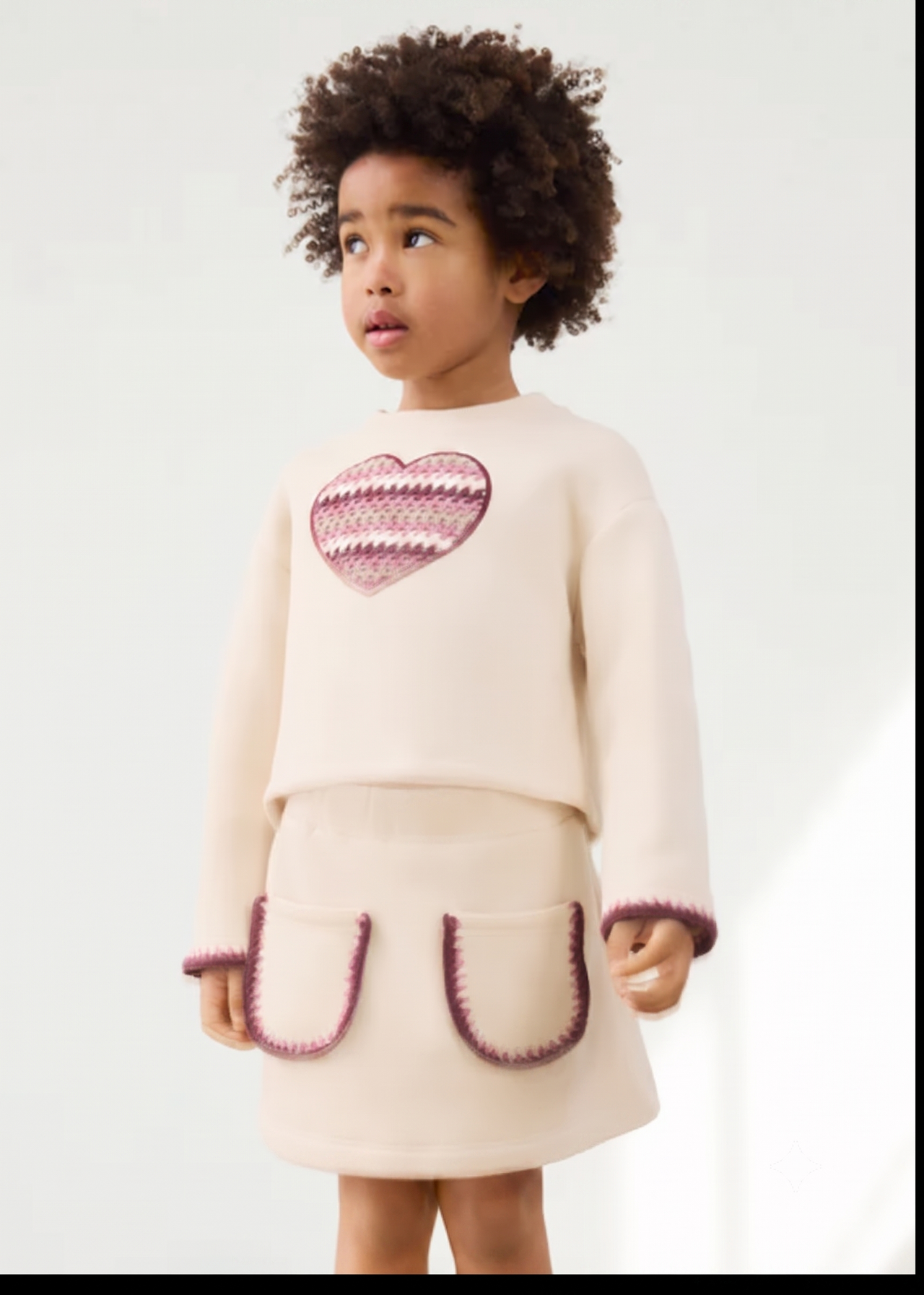 Conjunto falda felpa corazón niña