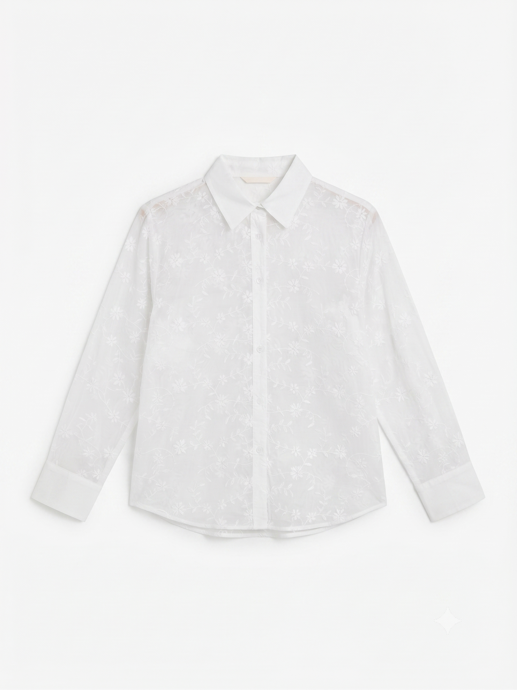 Camisa blanca con flores bordadas, chica.