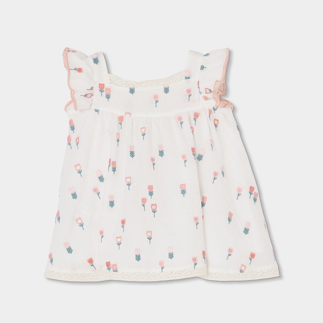 Vestido con ranita  de tejido fantasía de bebé niña
