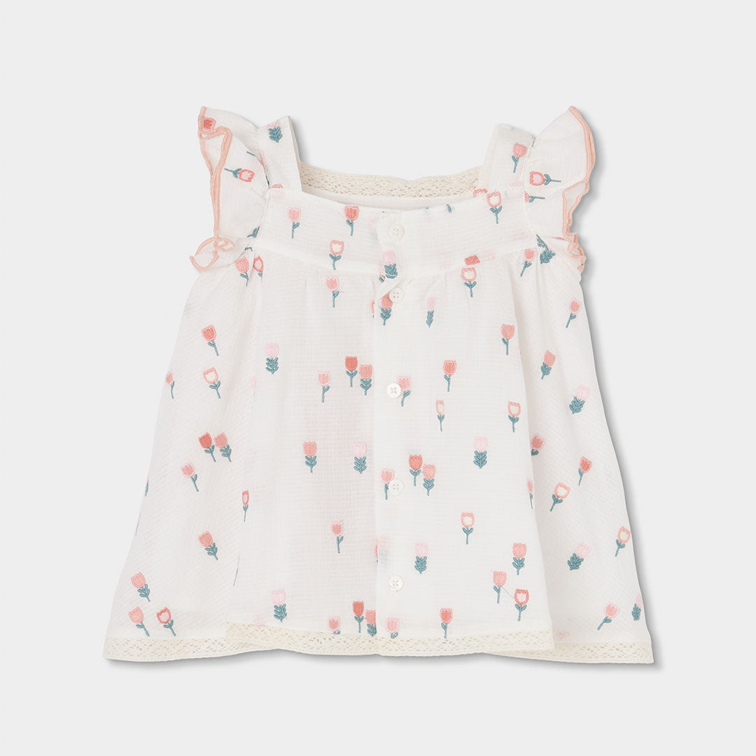 Vestido con ranita  de tejido fantasía de bebé niña