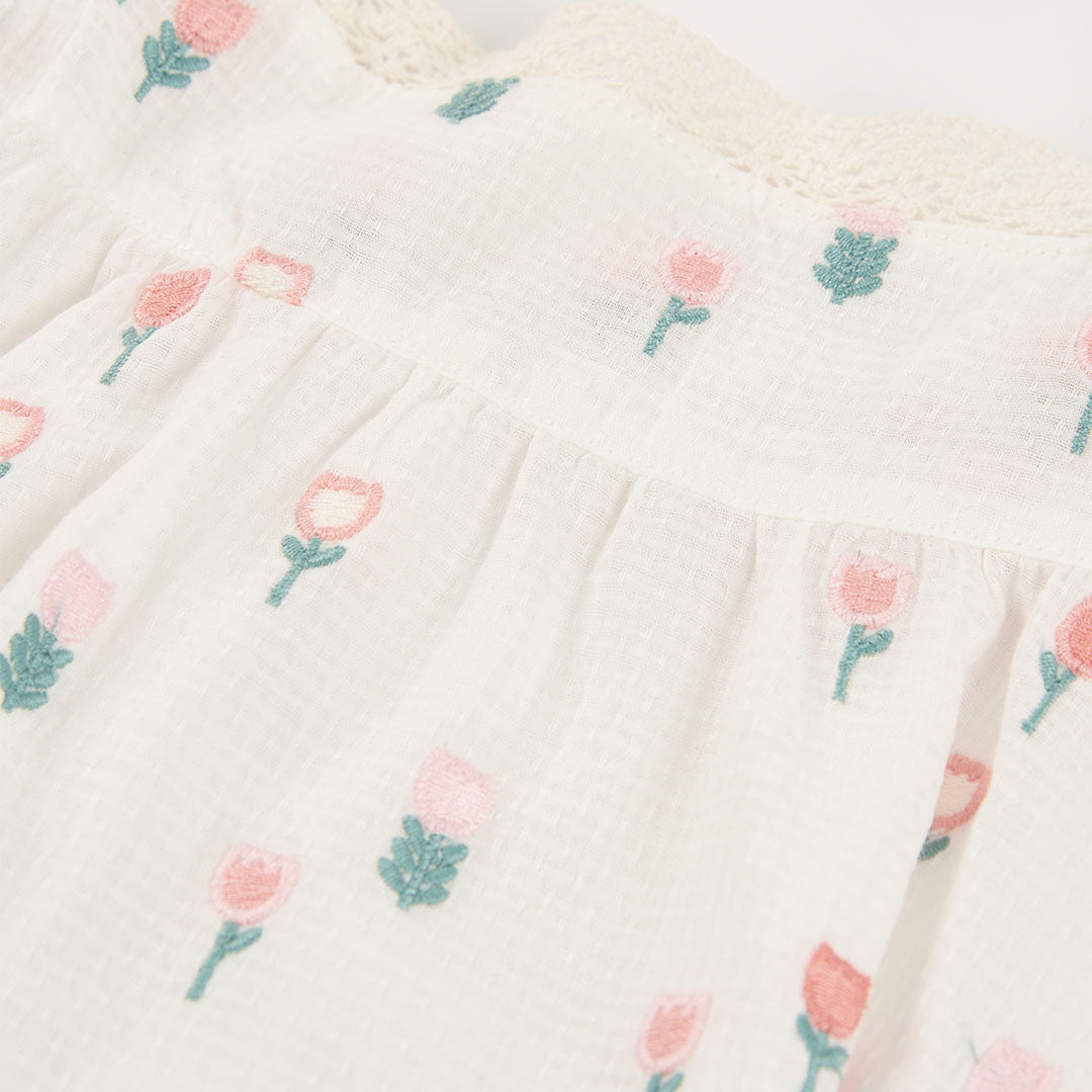 Vestido con ranita  de tejido fantasía de bebé niña