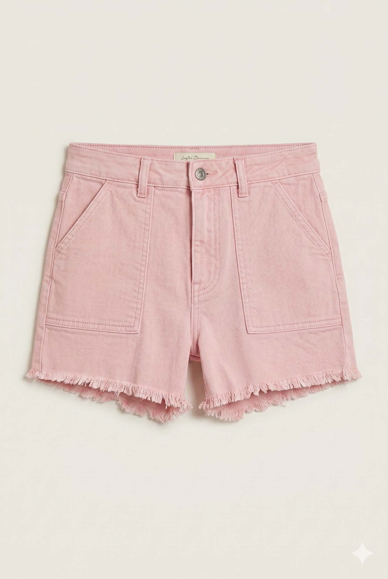 Pantalón corto denim rosa deshilachado chica.
