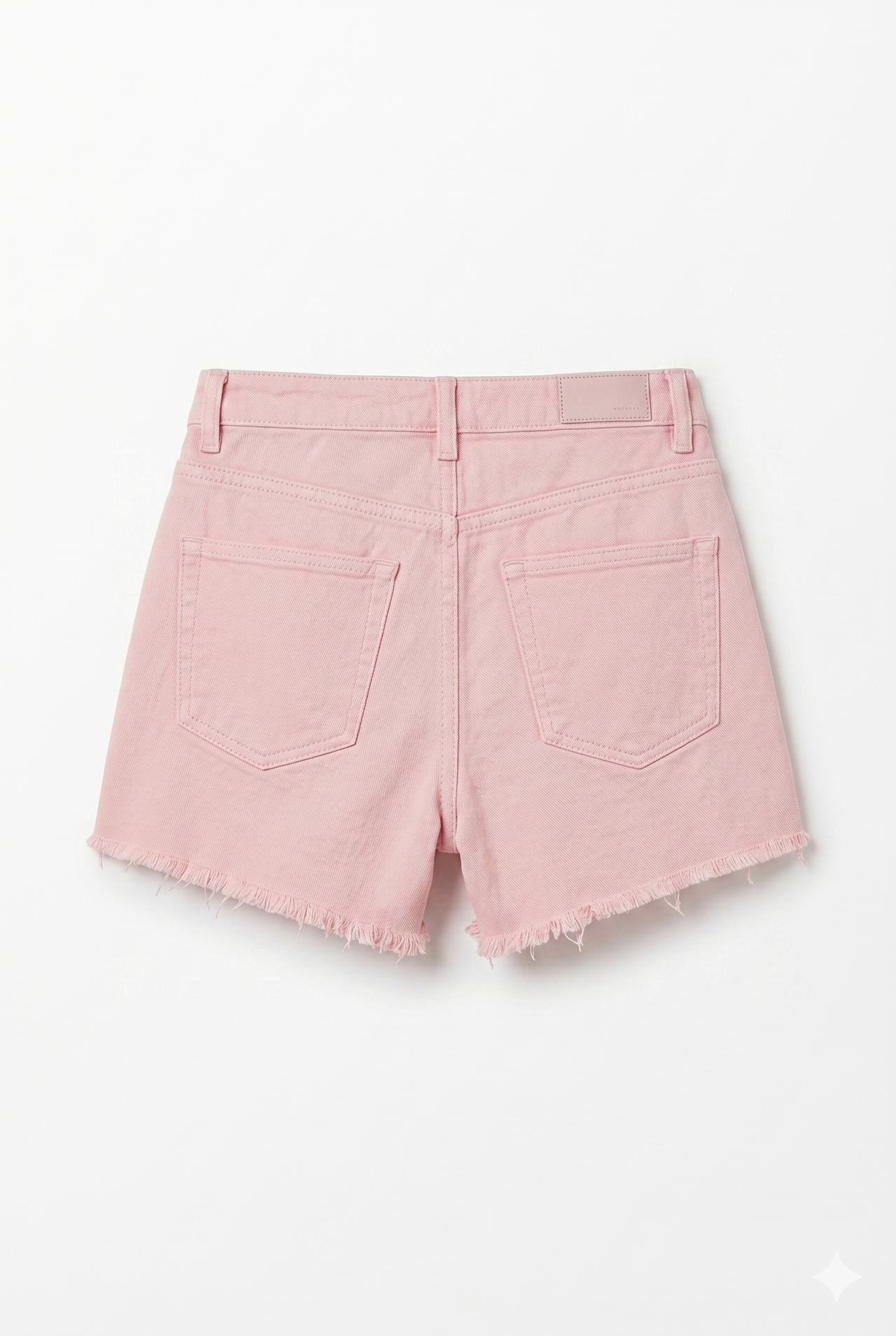 Pantalón corto denim rosa deshilachado chica.