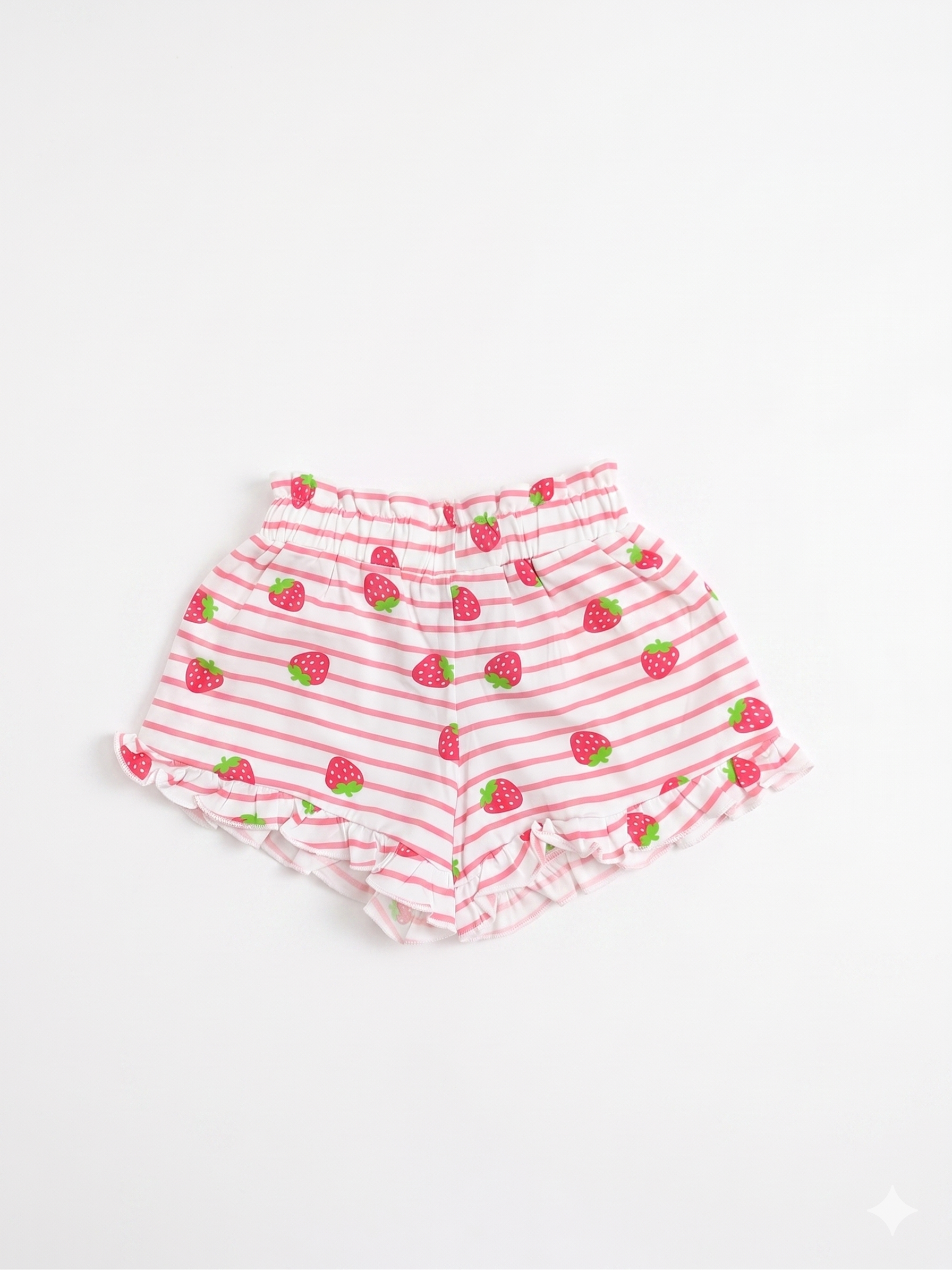 Pantalón corto de niña con volantes y fresas.