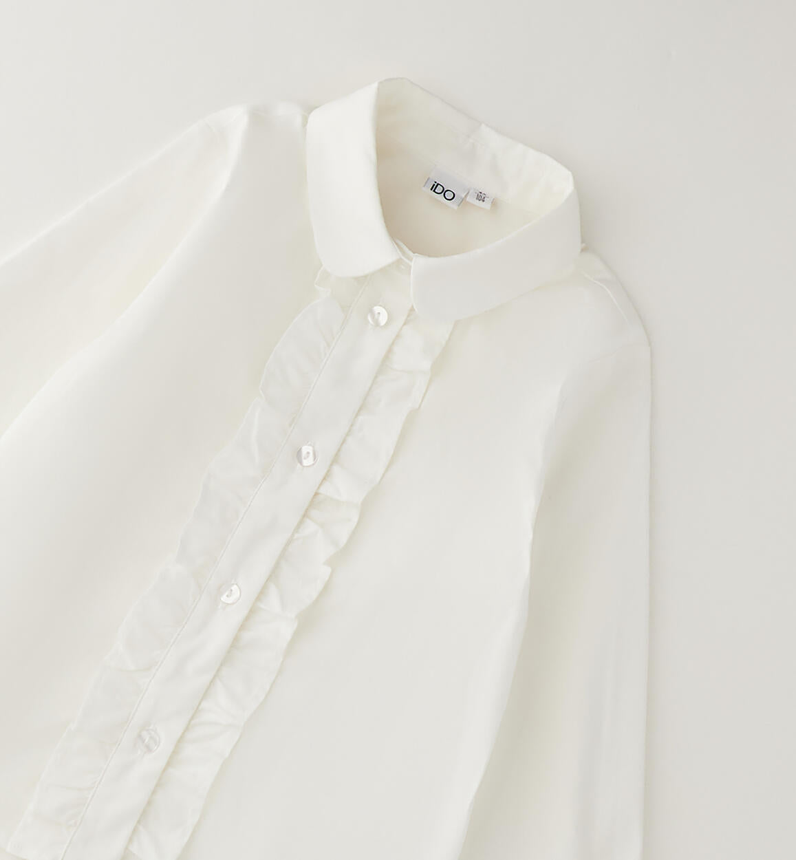 Camisa manga larga cuello bebé y volantes