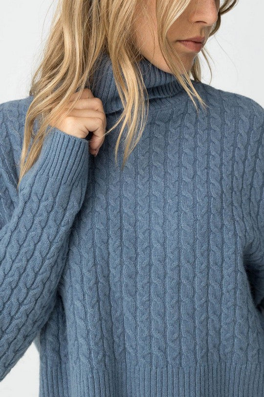 Jersey punto cuello alto