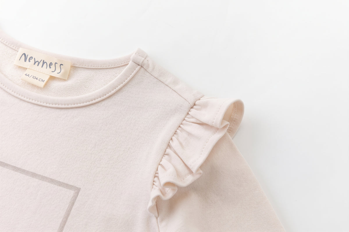 Camiseta manga larga flores volante hombros beige niña
