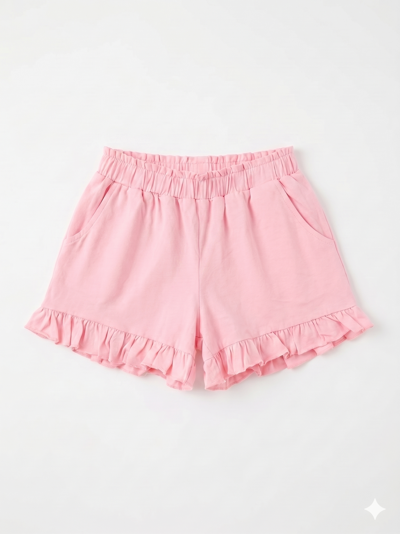 Pantalón corto de niña con volantes.