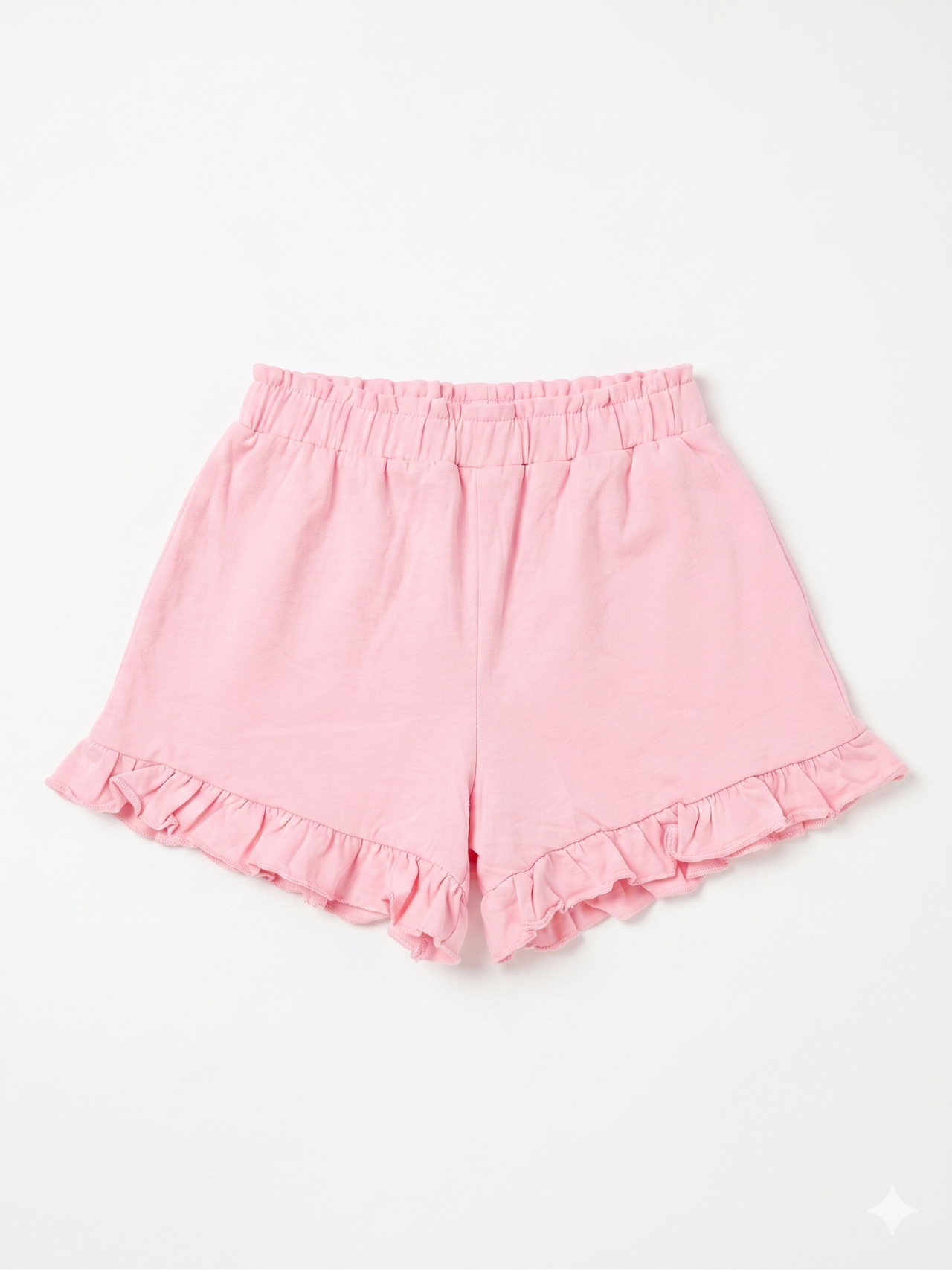 Pantalón corto de niña con volantes.