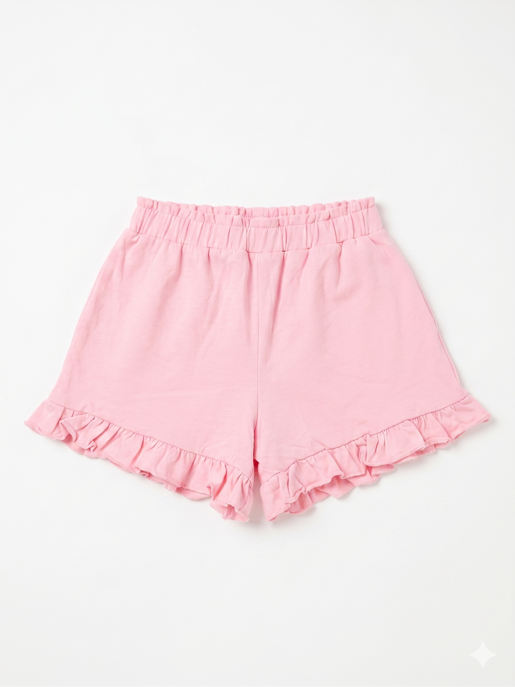 Pantalón corto de niña con volantes.