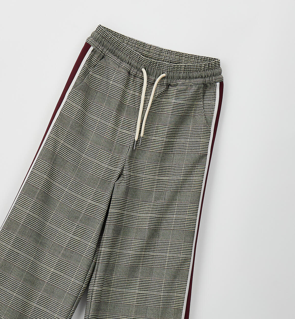 Pantalon largo de tejido estampado cuadros