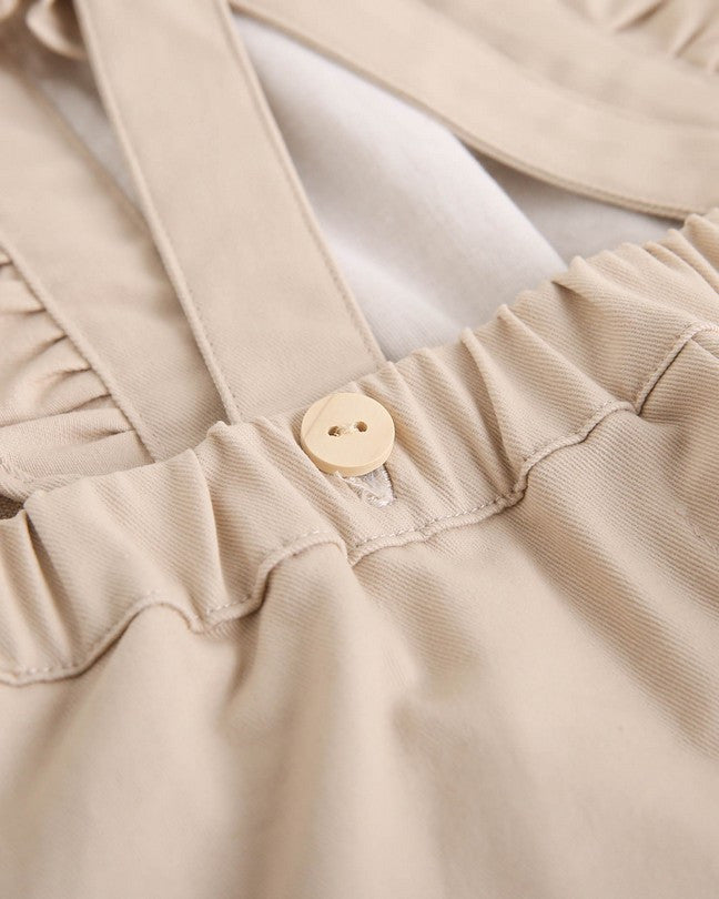 Peto De Niña Largo En Beige Con Volantes