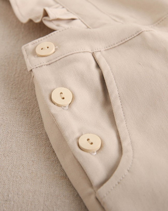 Peto De Niña Largo En Beige Con Volantes